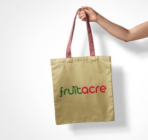 Free Hand Holding Tote Shopping Bag Mockup PSD